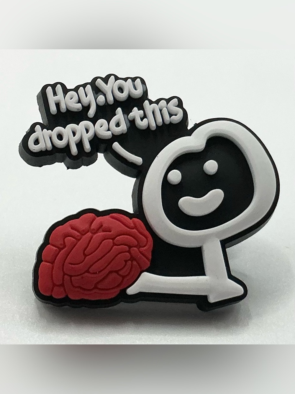 CUTE PVC LAPEL PIN HEY YOU DROPPED THIS BRAIN